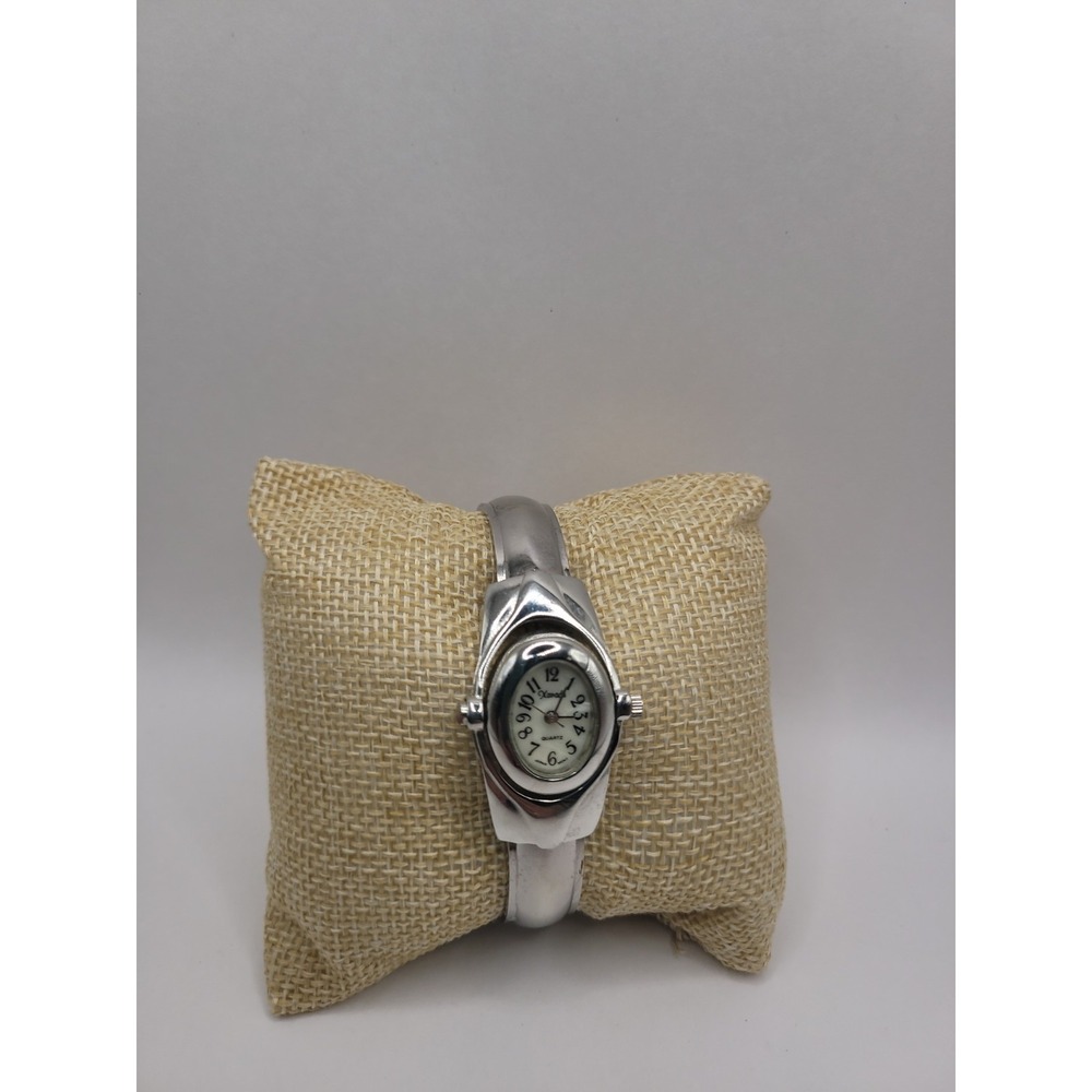 Xanadu Women's Silver Tone Hinged Cuff Bangle Quartz Watch Oval Dial Reverse